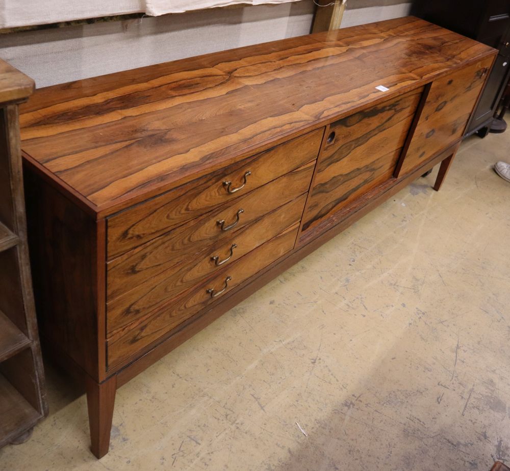A mid century rosewood sideboard, W.213cm, D.46cm, H.76cm